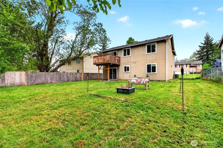 Large fully fenced back yard for all your activities.  Possible RV parking on right side of home or trailer parkings
