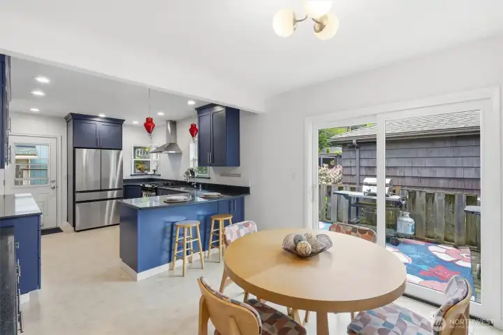 Sunny dining nook offers the perfect spot for morning coffee or casual meals.