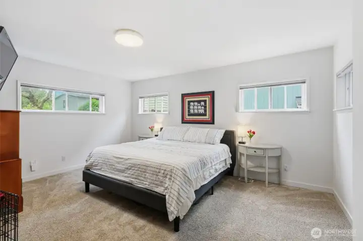 Comfortable primary suite featuring an ensuite bath and peaceful natural light.