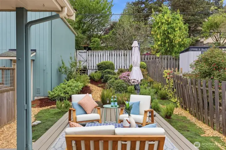 Spacious Trex deck offers the perfect setting for outdoor dining, entertaining, or relaxing evenings.