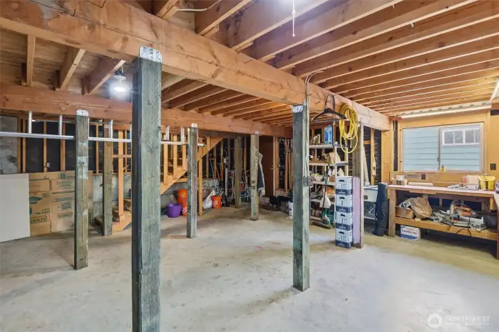 Expansive workshop and storage space offer endless possibilities for hobbies, projects, or organization.