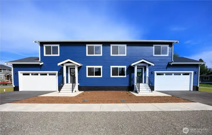 2-unit condo building. The gravel area is extra shared parking