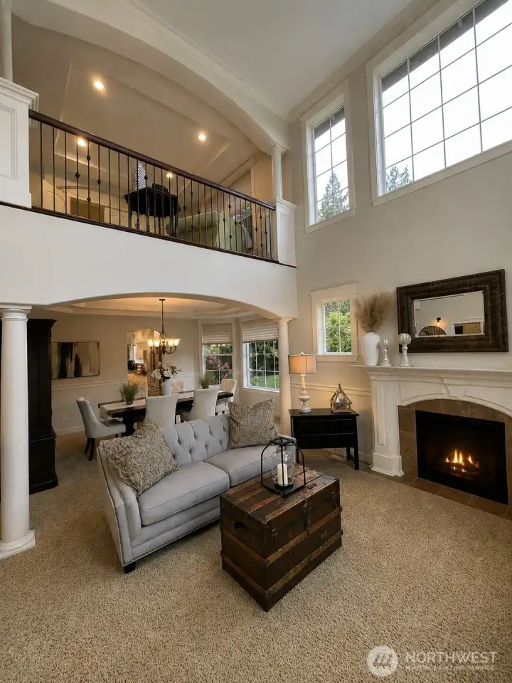 CLOSE UP VIEW of the LOFT SITTING RM, DINING RM and a portion of LIVING RM
