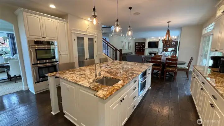 ANOTHER ANGLE LOOKING THRU THE KITCHEN TO THE FAMILY ROOM.