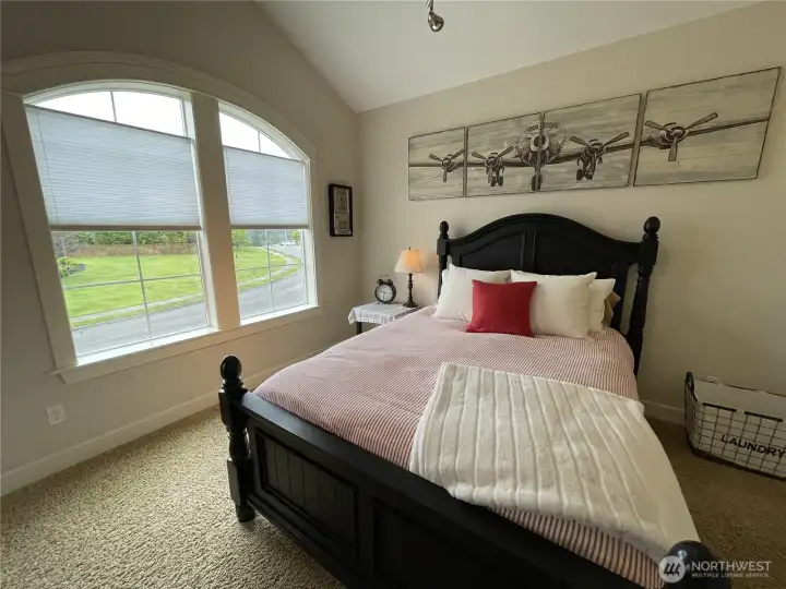 BEDROOM 1 with VIEWS OF FRONT YARD, w/ACCESSES EXTERIOR COVER BALCONY COVE & MORE CRAFTSMAN WINDOW TRIMS & WIDE BASEBOARDS