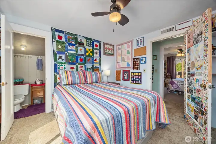 Guest Bedroom #1 with attached 1/2 bath