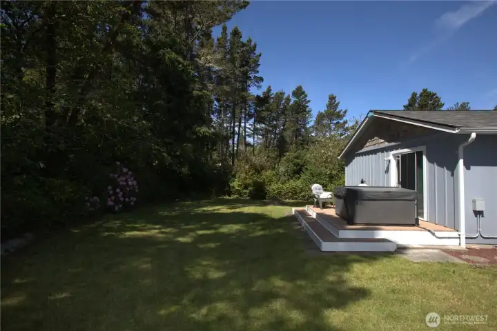 Secluded backyard with 2 person hot tub.