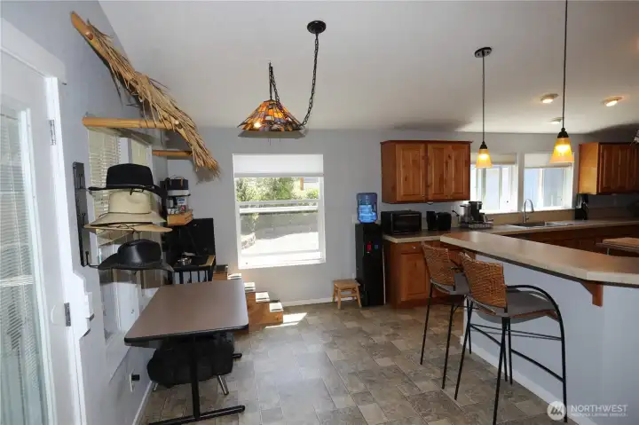 Kitchen with eat at bar.