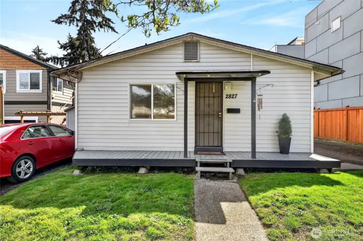unit 2827 is in the front has a porch and a sunny yard. unit 2827 is in the front has a porch and a sunny yard.