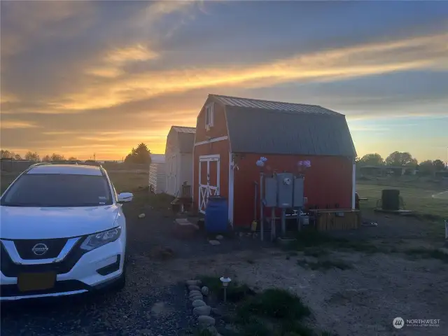 Lovely Sunset + mini-barn Sheds! Red one has second level.