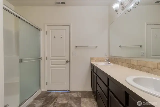 full bathroom attached to primary bedroom