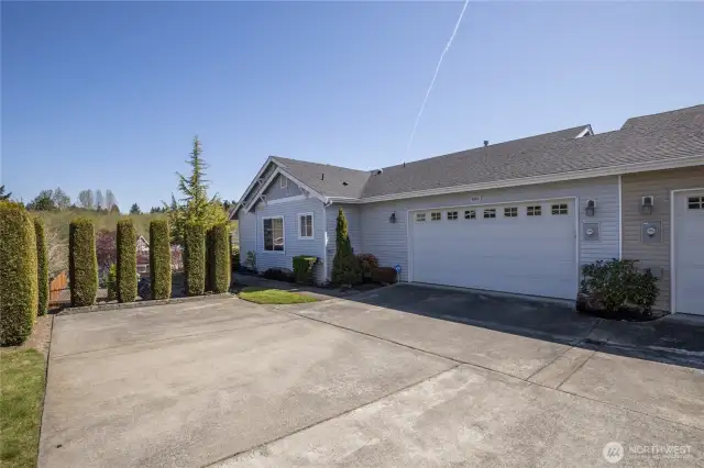 Attached 2-car garage plus extra driveway parking