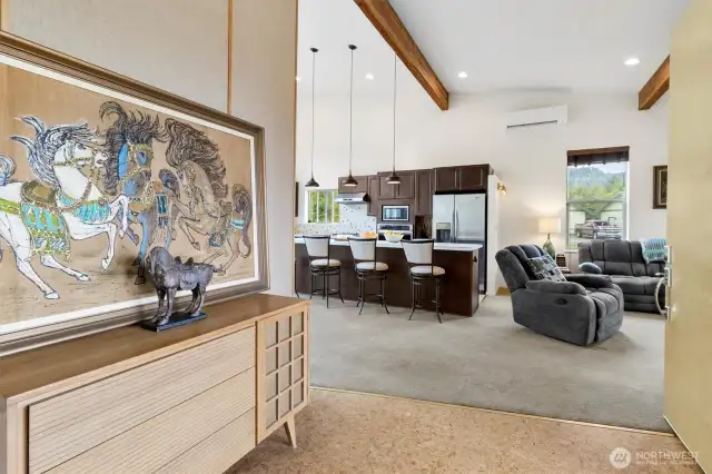 Open entry way leading to the living area and kitchen