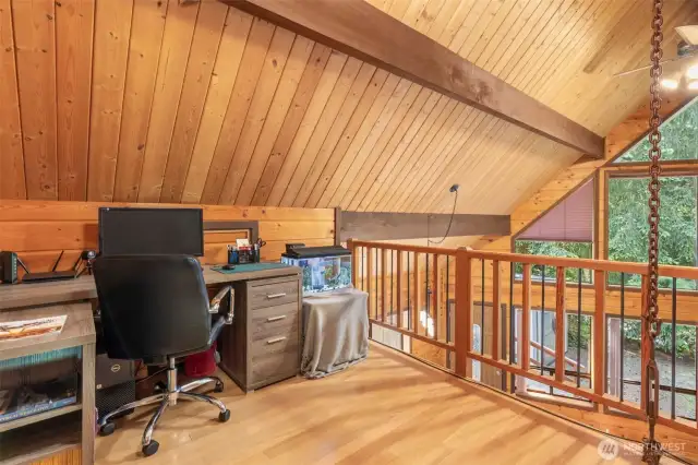 The lofted flex space makes a great home office.