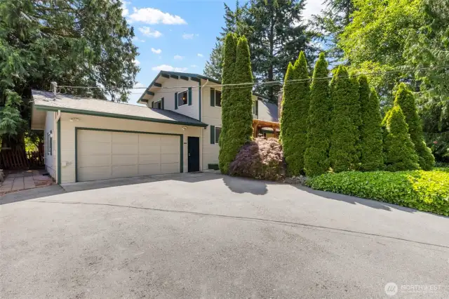 The large two car garage has plenty of storage and room for projects.