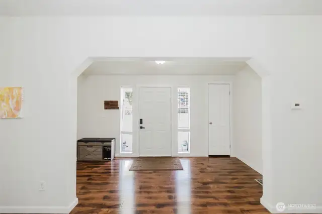 How cute is this entryway? Large enough to hang your backpacks or work gear on a coat tree maybe?