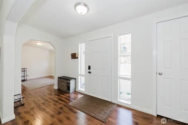 Entry, coat closet and opening to the dining area