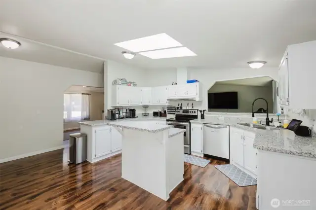 So much counter space and cabinet space! And that pass through is everything!