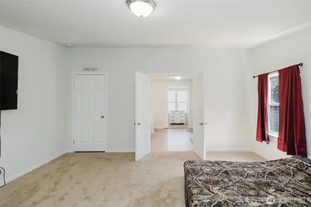 Double doors to the ensuite and walk in closet.