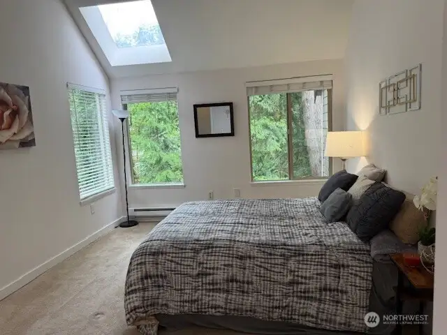 Creekside bedroom feels like your in a treehouse!