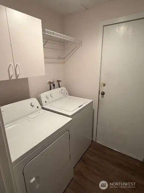 Mud room off the garage houses the full size laundry