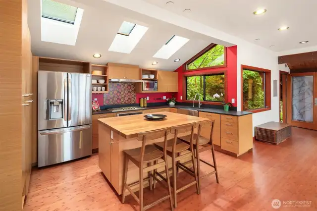 Gorgeous cabinetry in your light filled kitchen.