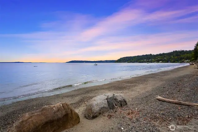 This beach was overhauled completely to have a "natural bulkhead" installed (at great expense). This is better for the environment and works beautifully. It is also lovely to behold.