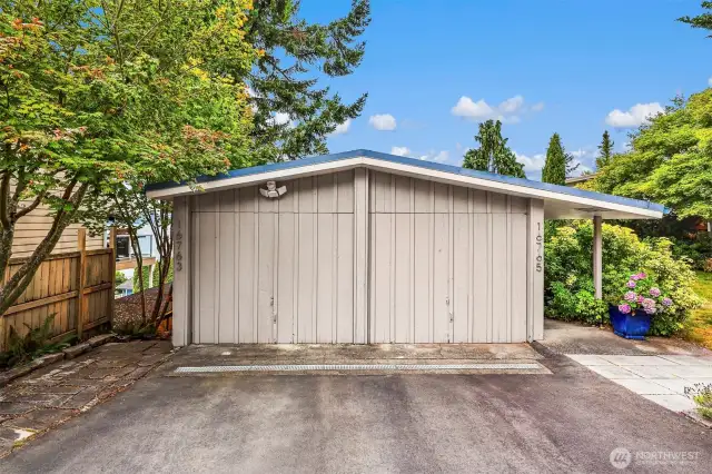 Parking for this home includes one space inside this garage and one space in front of it (Left side).