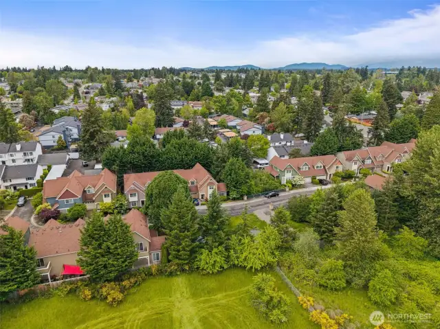 End unit, surrounded by privacy in an exclusive gated community!