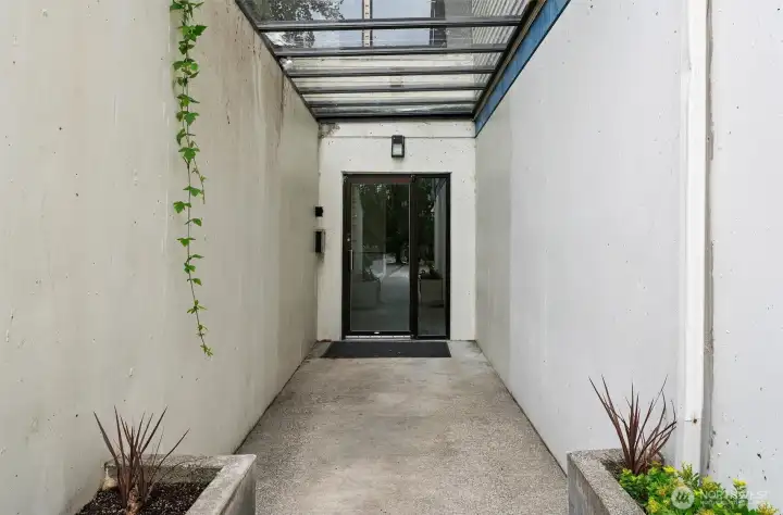 Boutigue Complex with Secure Entry, Lobby Entrance, Community Courtyard & Guest Parking.