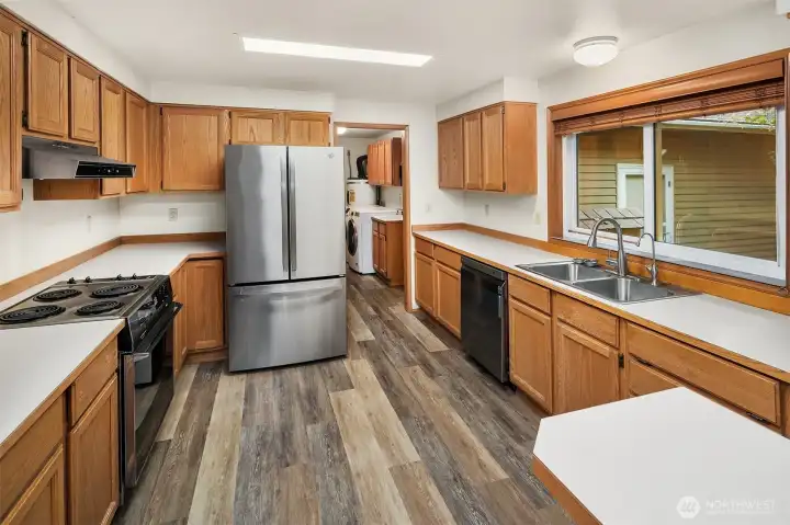 View of kitchen. Appliances are included