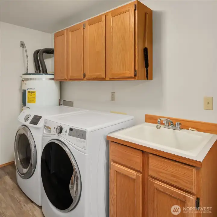 laundry room off of garage. washer, dryer and freezer are included