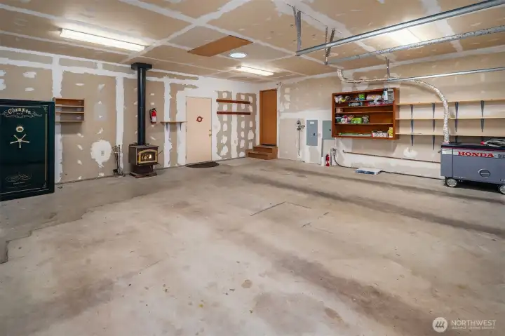2 car garage with wood burning stove, generator and safe included