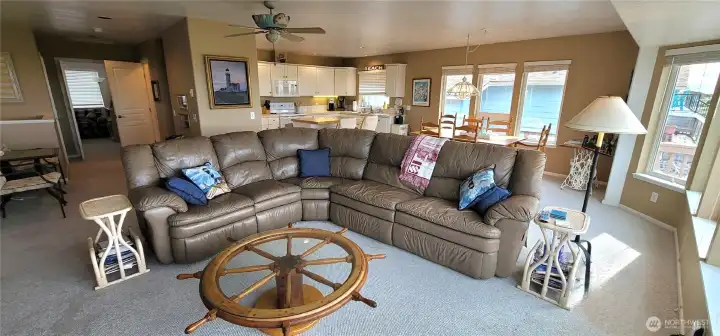 Main floor great room encompasses kitchen, dining and living area.