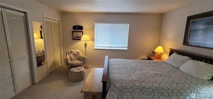 Primary bedroom with two closets and ample storage