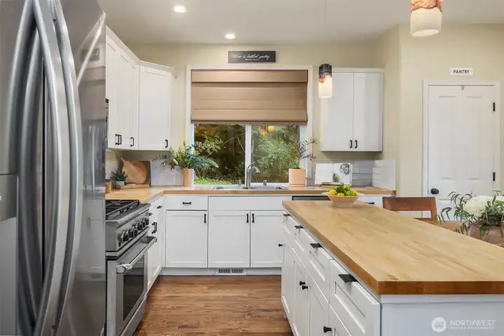 The kitchen cabinetry was just professionally refinished.