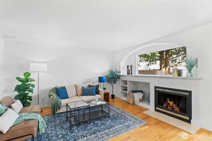 Large living area with cozy gas fireplace.