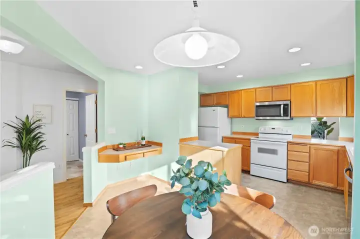 Huge wide open kitchen with pass through to dining room.