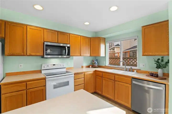 Huge wide open kitchen with pass through to dining room.