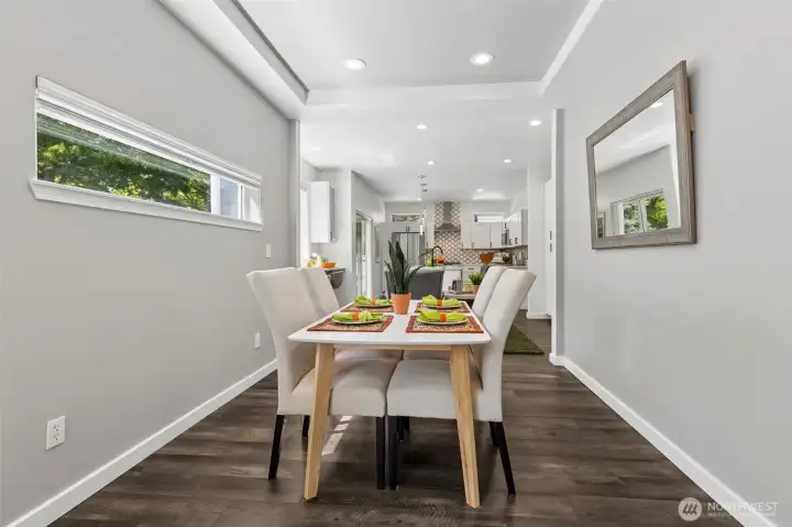 Beautiful dining room space on the brightest side of the home sets the mood for great conversations back and forth between the kitchen, eating bar and dining room without feeling left out of the conversation. Set on .18 acres with a little extra elbow room, it gives the entire home a relaxed feel. Beautiful dining room space on the brightest side of the home sets the mood for great conversations back and forth between the kitchen, eating bar and dining room without feeling left out of the conversation. Set on .18 acres with a little extra elbow room, it gives the entire home a relaxed feel.