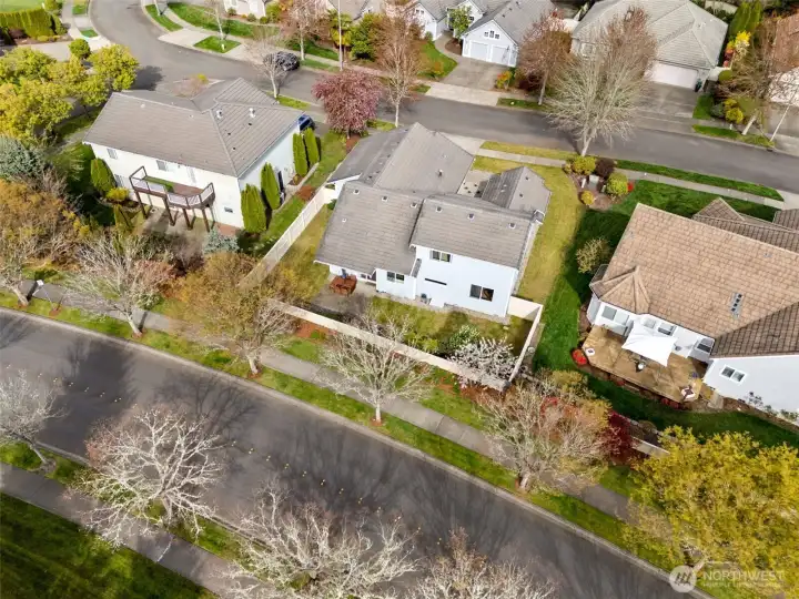 Behind the fence, there’s a stretch of sidewalks before you even reach the neighborhood road, adding that extra layer of separation that makes the backyard feel more tucked away than most. It’s a subtle detail, but it changes the experience in all the right ways. And then you look around and see it, surrounding homes that are clearly cared for, clean, maintained, and reflecting that pride of ownership that elevates the entire street. Built in 2002, this home has kept up and then some, with thoughtful updates that bring it right into today without losing its solid foundation.