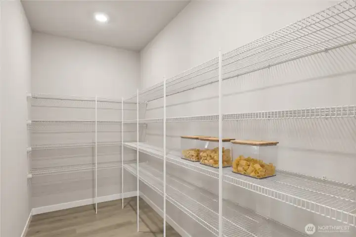 Pantry with motion sensor and tons of storage. Photo's are for representational purposes only. Colors and finishes may differ.