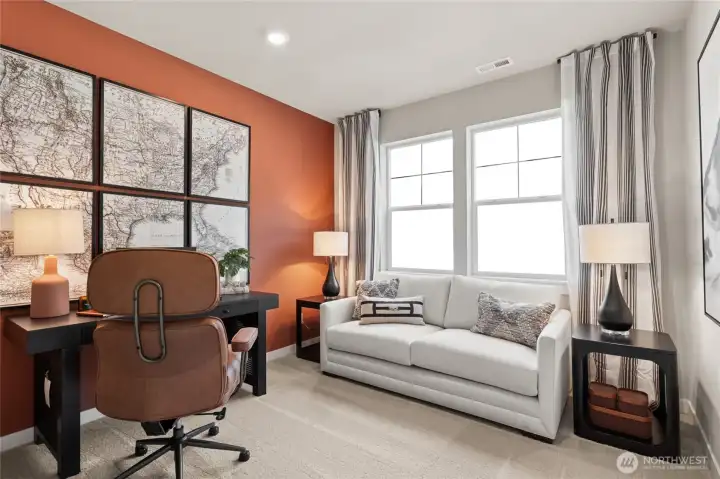 Main floor bedroom/den. Photo's are for representational purposes only. Colors and finishes may differ.