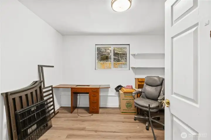 1 of 2 bonus rooms off of garage, perfect for home office, studio, or craft room.