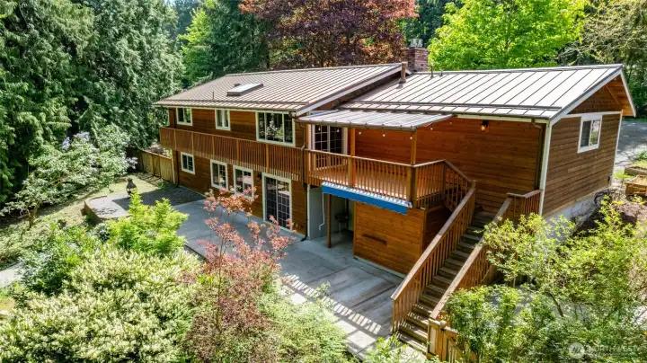 Back of the home. Metal roof.