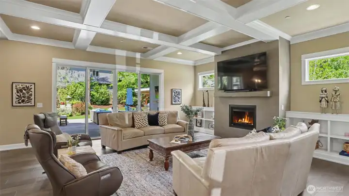 Double sliding glass doors give way to the alluring covered patio with yet another fireplace for year round enjoyment. Extensive wide plank oak hardwood floors featured on the main floor. Double sliding glass doors give way to the alluring covered patio with yet another fireplace for year round enjoyment. Extensive wide plank oak hardwood floors featured on the main floor.