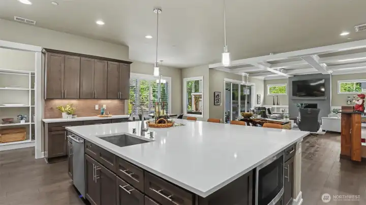 Costco size pantry conveniently located adjacent to the stunning island. Costco size pantry conveniently located adjacent to the stunning island.