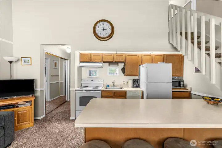 Kitchenette with plenty of storage and seating at the island Kitchenette with plenty of storage and seating at the island