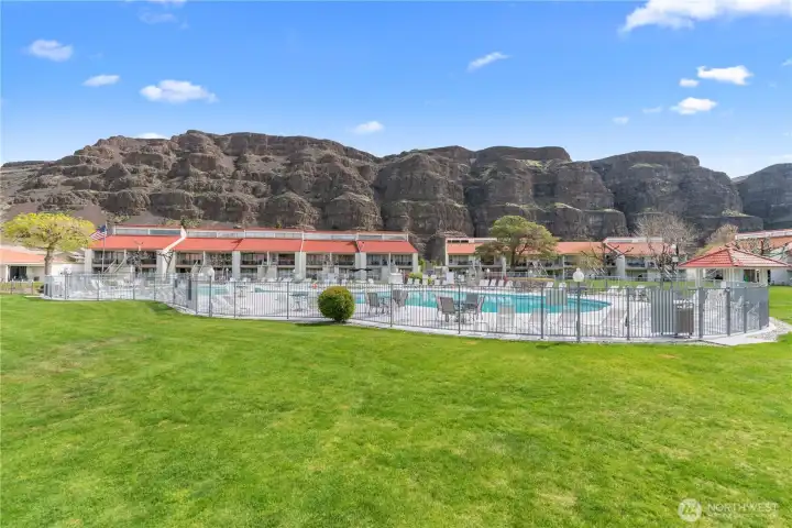 Beautifully landscaped courtyard featuring a sparkling private pool and lounge area, perfect for relaxing or entertaining. Beautifully landscaped courtyard featuring a sparkling private pool and lounge area, perfect for relaxing or entertaining.