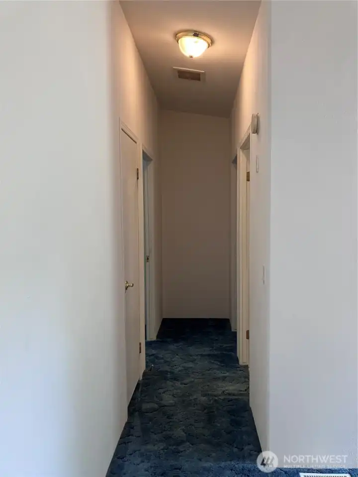 hallway to guest bath & guest bedrooms hallway to guest bath & guest bedrooms